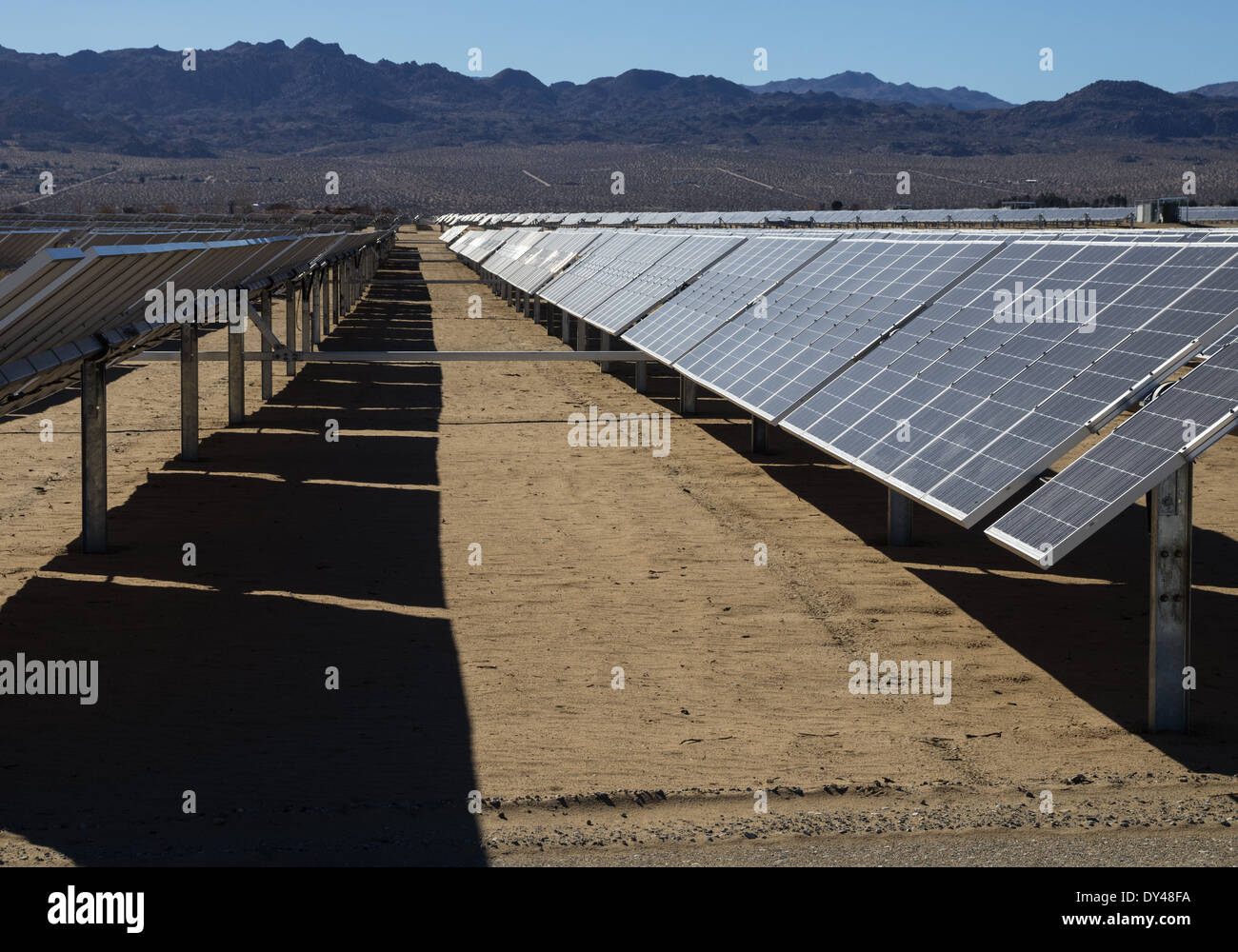 photovoltaic solar electric power plant with tracking panels in the desert Stock Photo