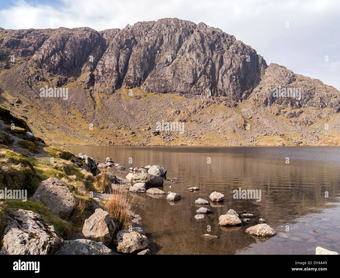 Pavey Ark and Stickle Tarn amongst the Langdale Pikes, Lake District, Cumbria, England, UK Stock Photo