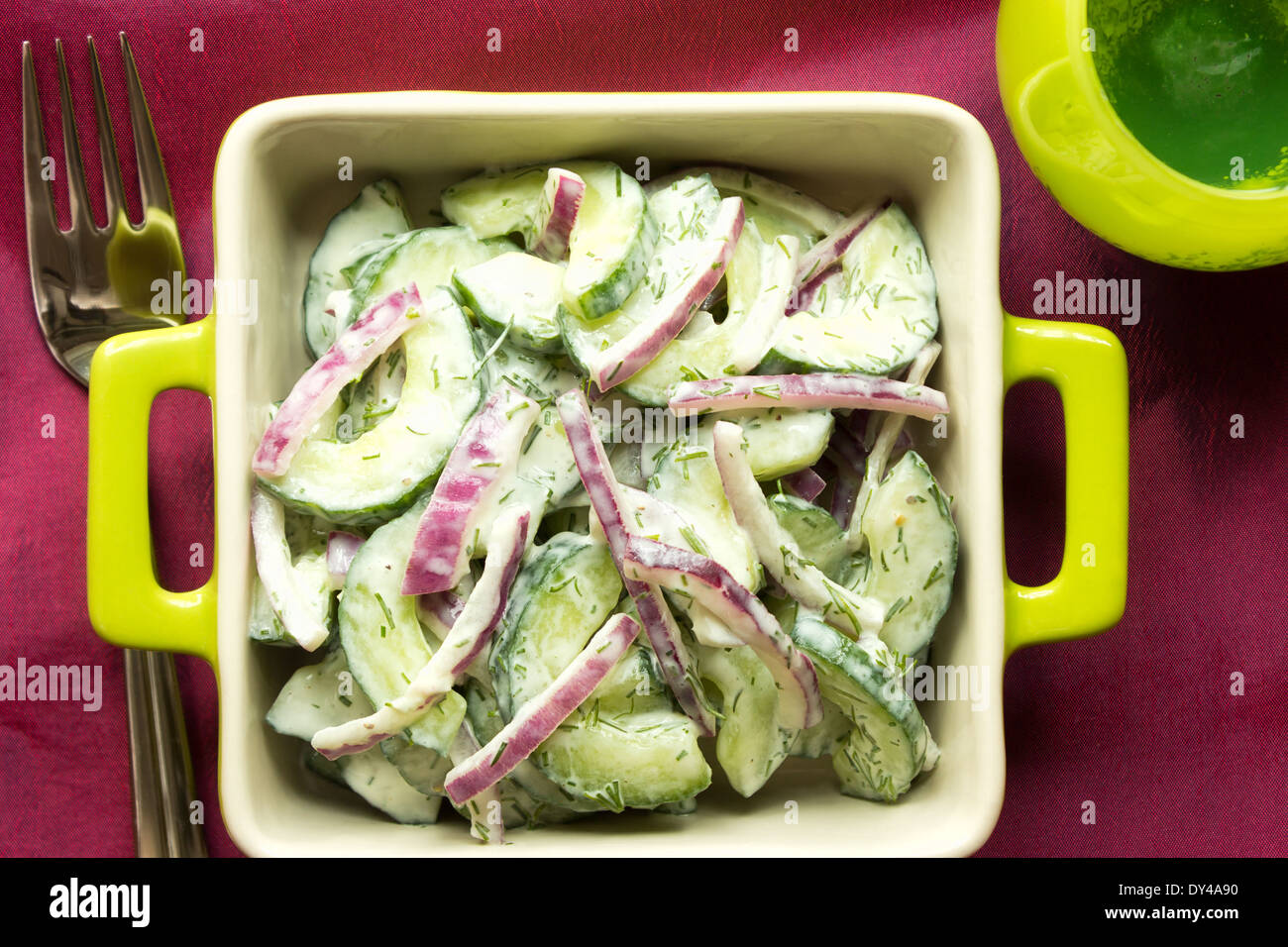 Delicious and healthy cucumber and red onion salad with low fat sour