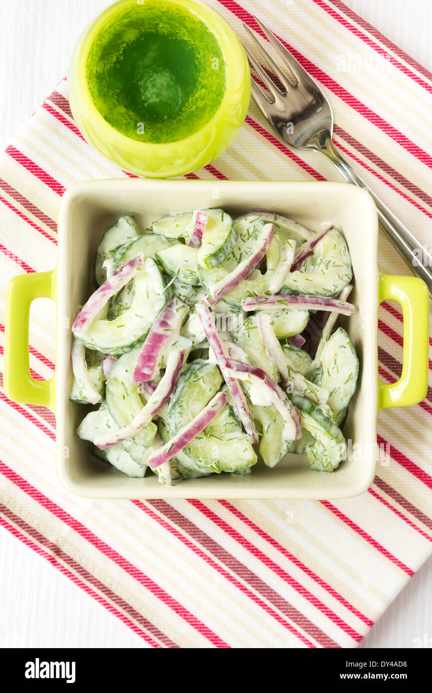 Delicious and healthy cucumber and red onion salad with low fat sour