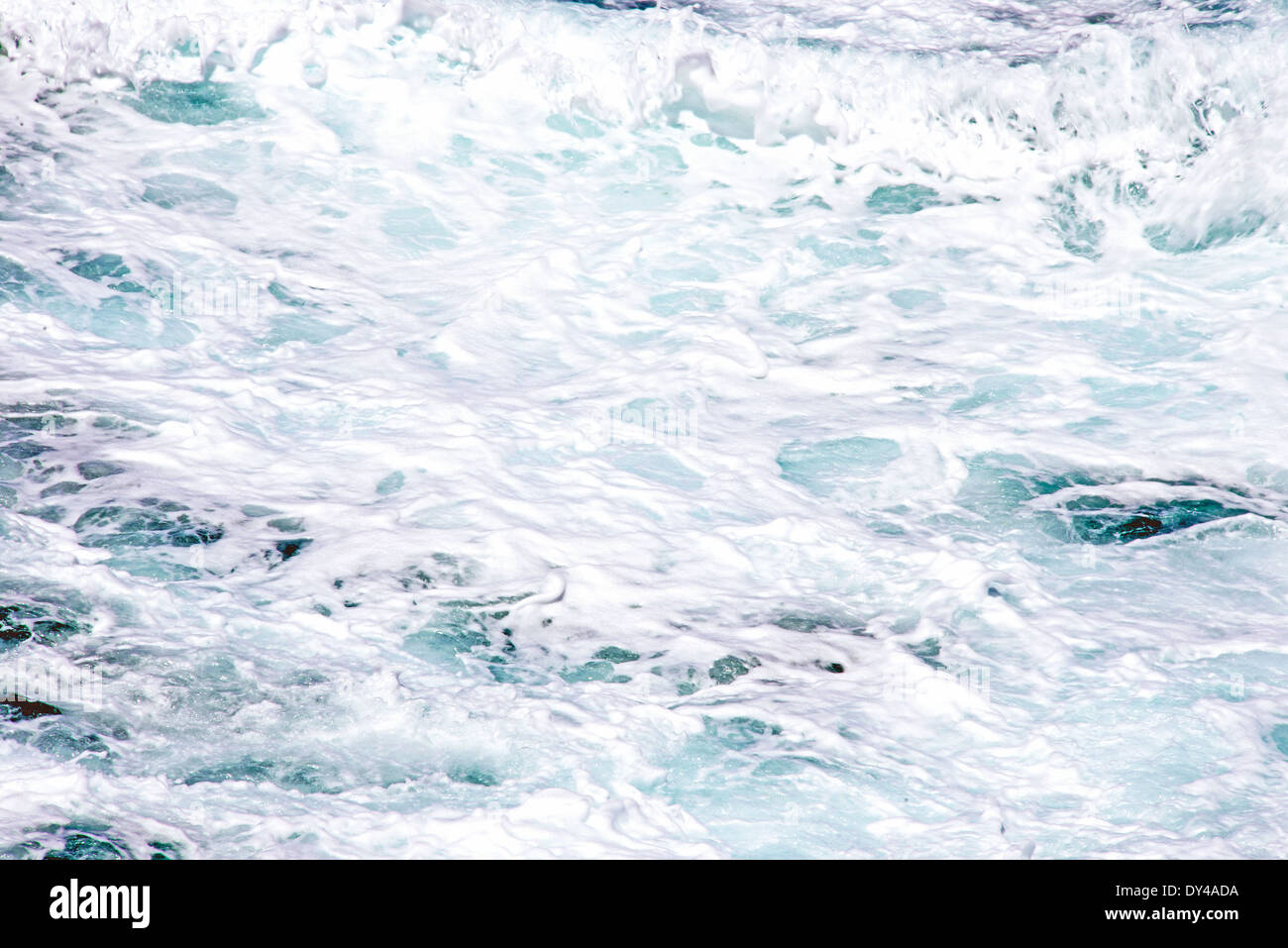 Detail of a raging sea, for use as background or texture or metaphor. Stock Photo