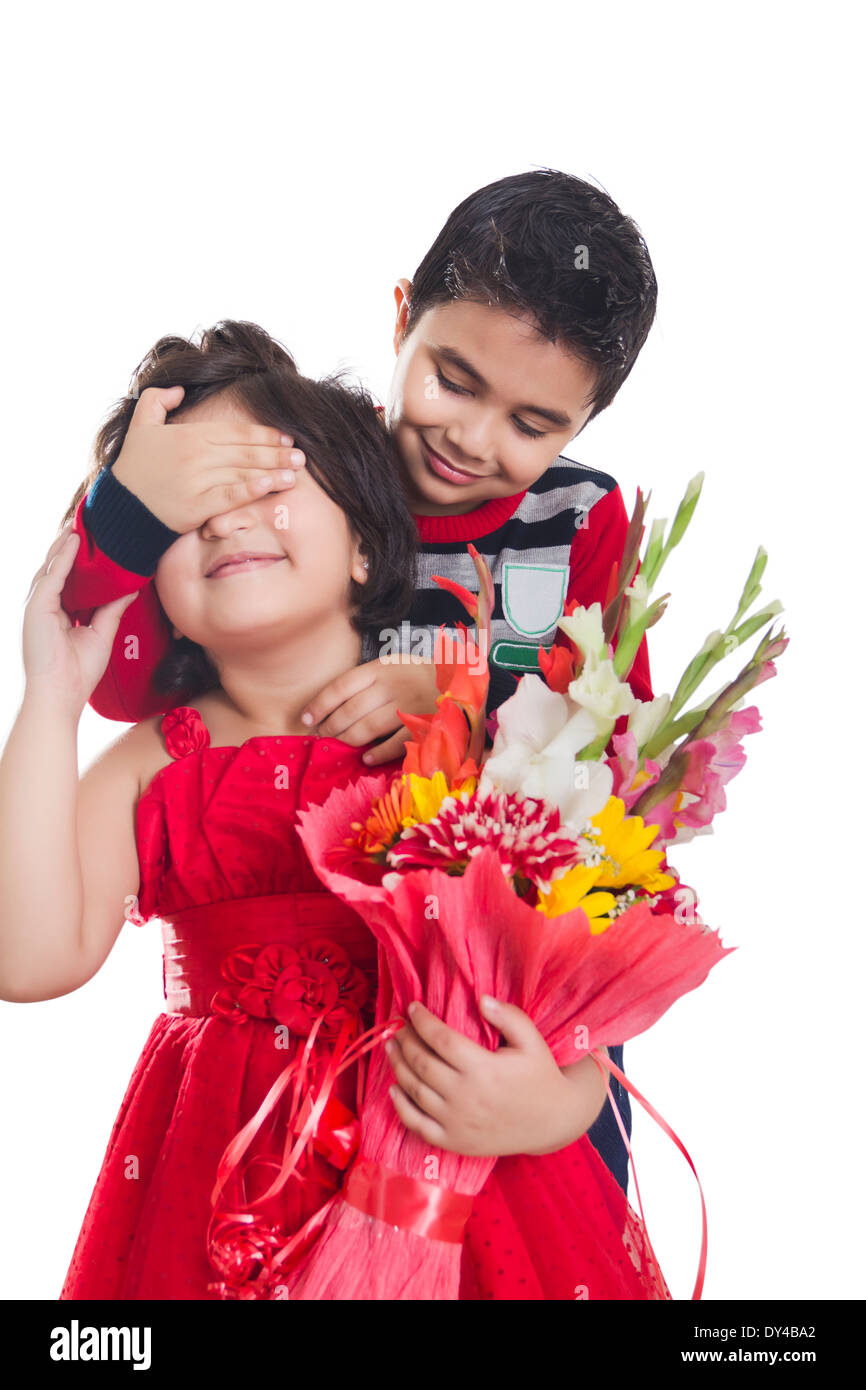 Indian Kids Couple Bouquet Presents Stock Photo - Alamy