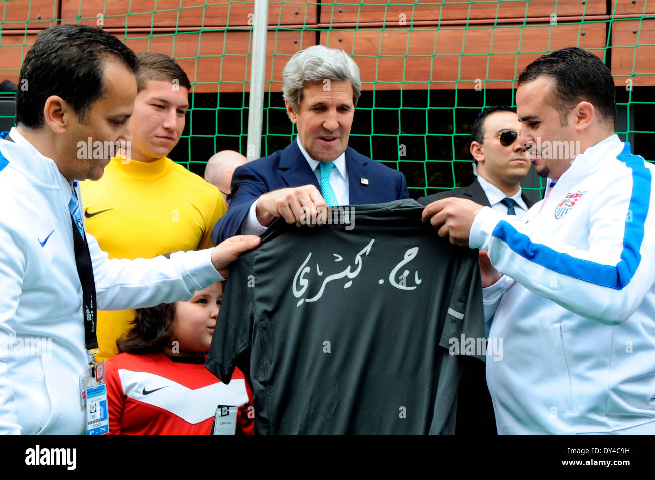 US Secretary of State signs a Team USA World Cup jersey after speaking about State Department Sports Diplomacy programs during a visit to a shoemaker's flagship store April 3, 2014 in Algiers, Algeria Stock Photo