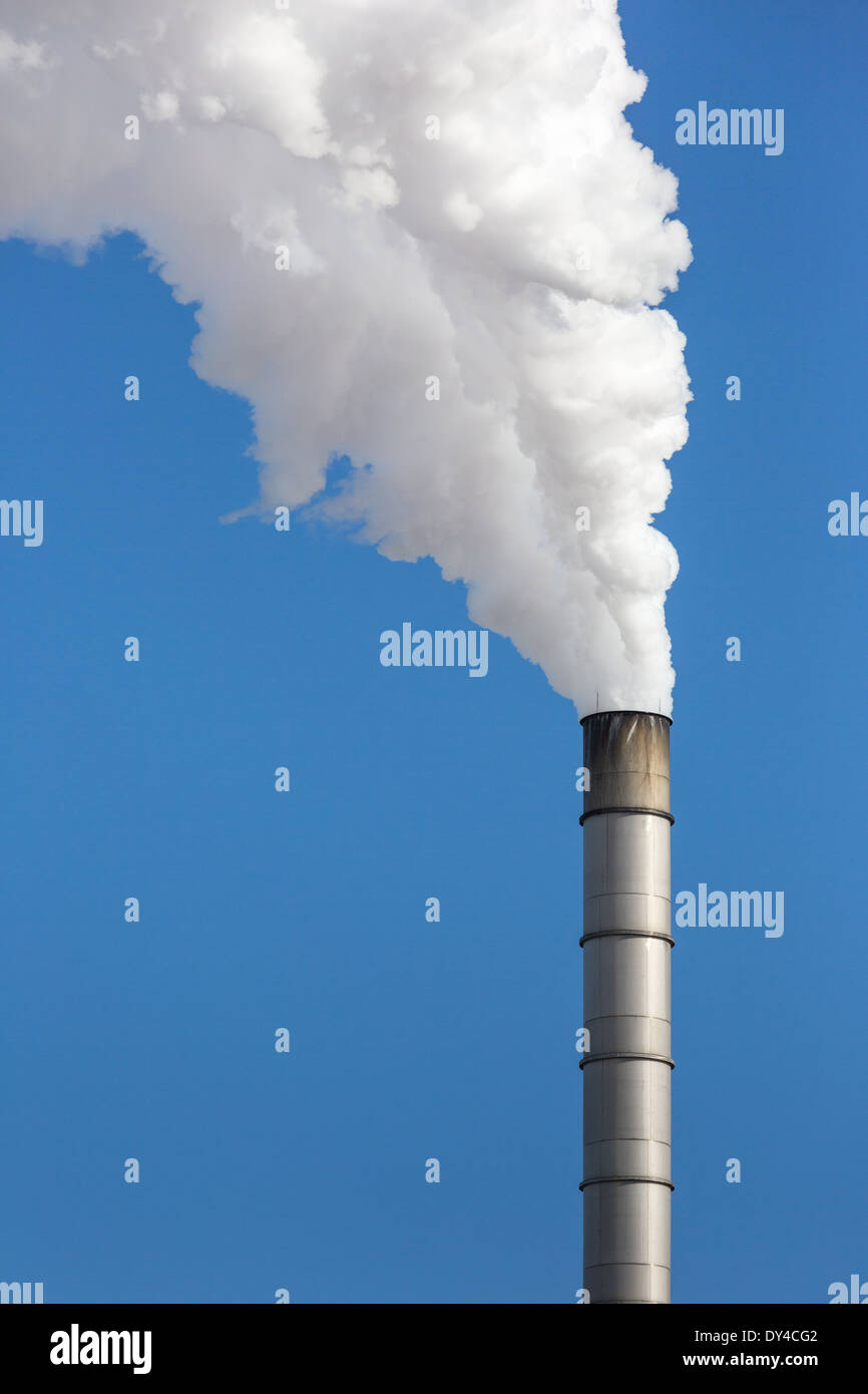 Paper mill billowing out smoke Stock Photo