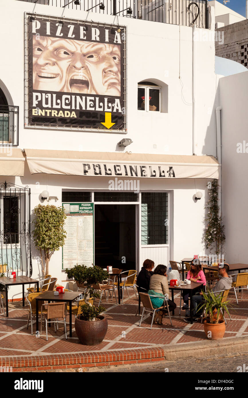 Spanish pizzeria people sitting outside at a Pizza restaurant in
