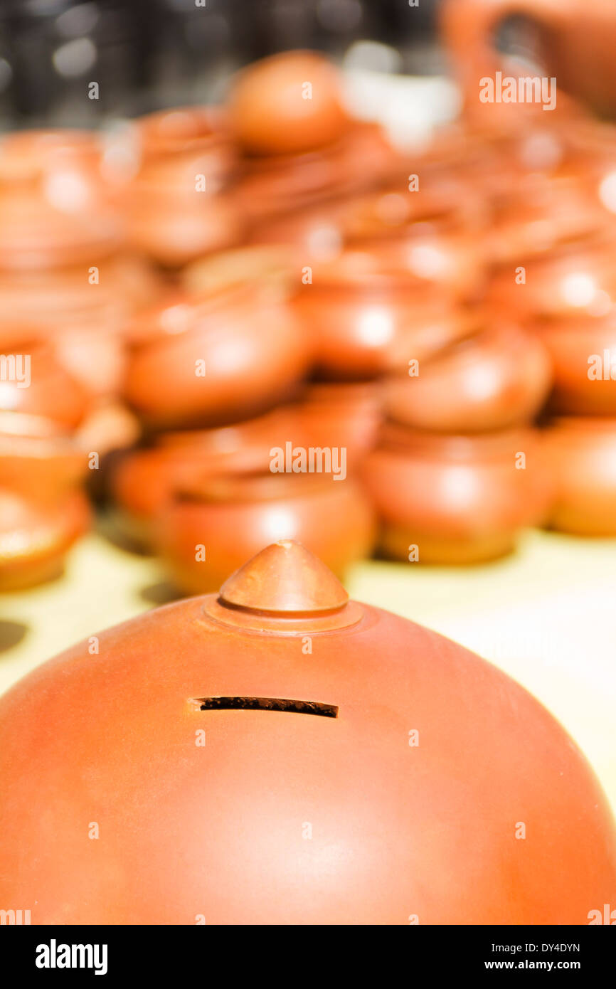 Pottery piggy bank hole hires stock photography and images Alamy