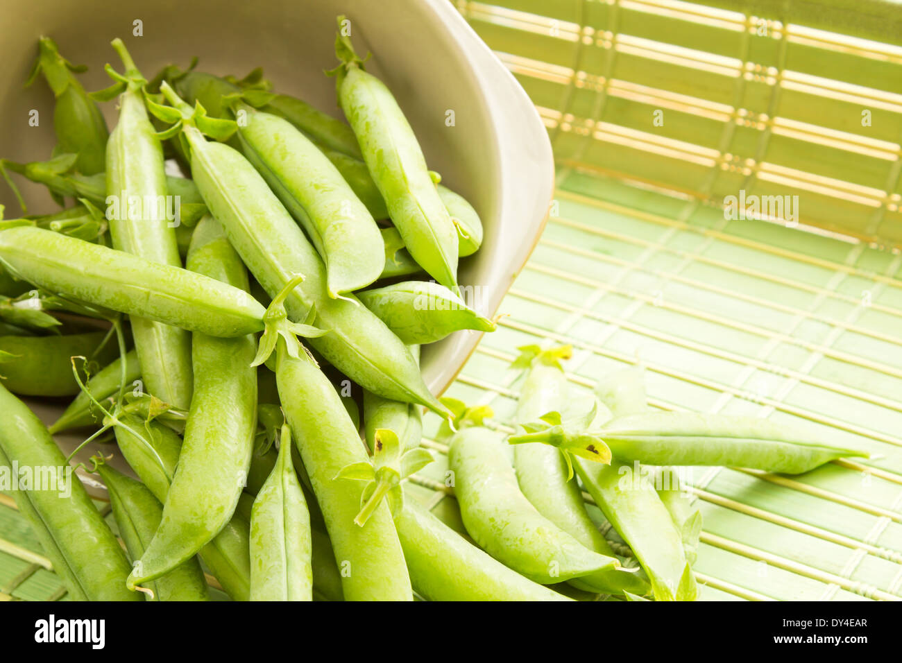 Fresh Organic Peas in a bowl Stock Photo