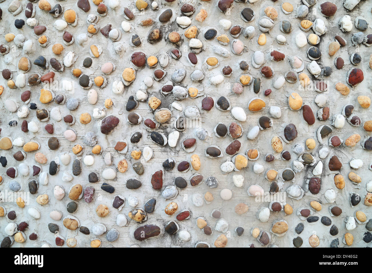 View of Pebbles in concrete wall texture background Stock Photo - Alamy