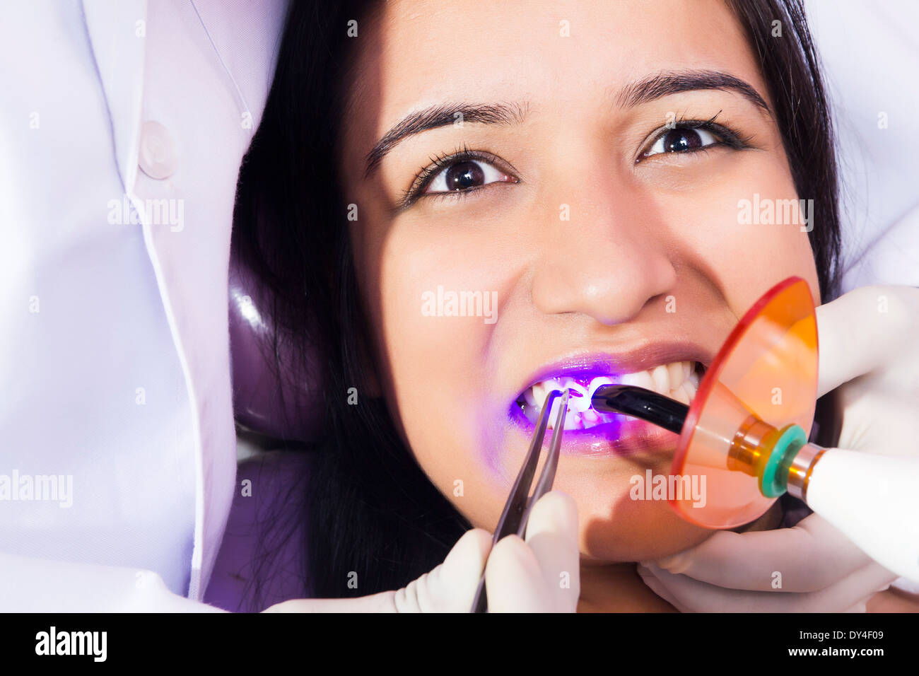 Indian Dentist Checking Teeth Stock Photo