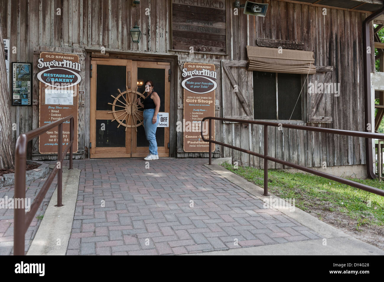 Woman entering the Pancake house at Deleon Springs State Park, Florida
