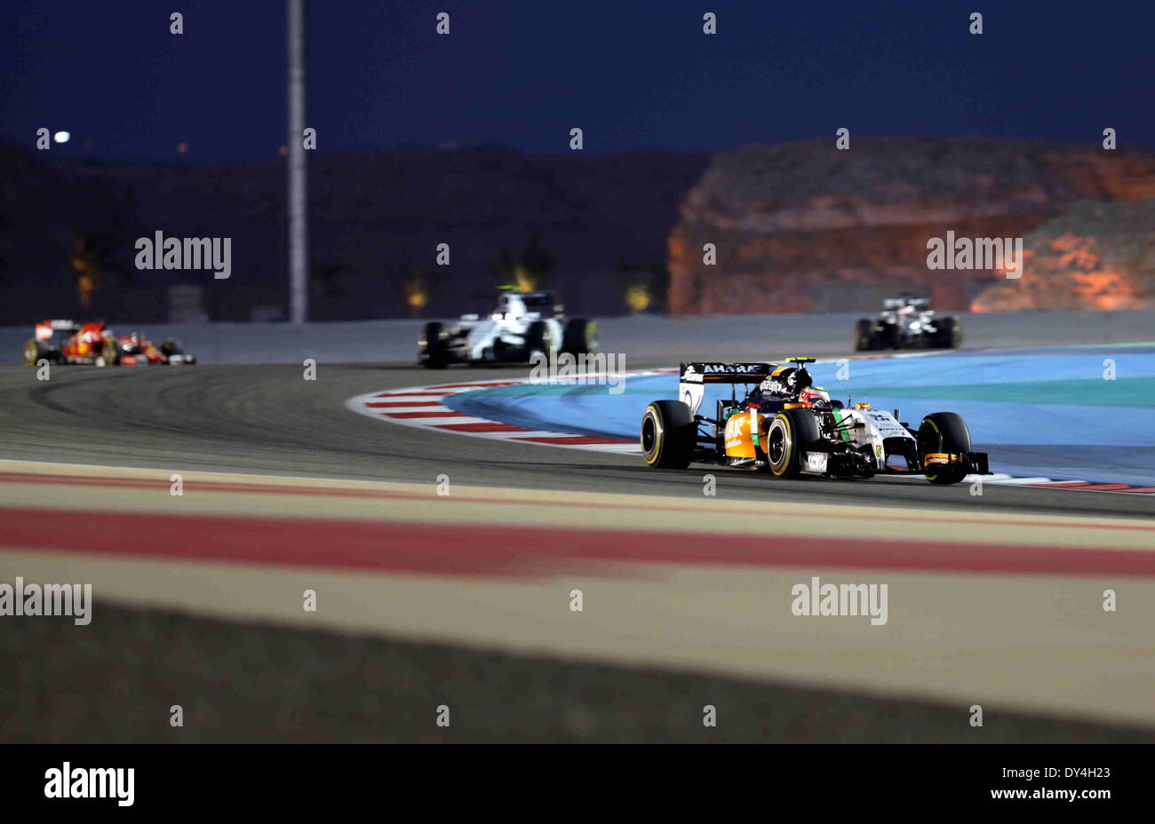 Manama, Bahrain. 06th Apr, 2014. Force India's Sergio Perez competes during the final of Formula 1 Bahrain Grand Prix in Manama, Bahrain, on April 6, 2014.  Credit:  Hasan Jamali/Xinhua/Alamy Live News Stock Photo