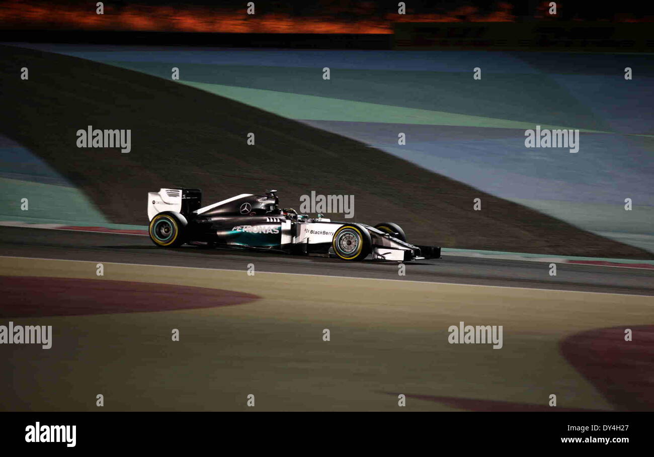 Manama, Bahrain. 06th Apr, 2014. Mercedes' Lewis Hamilton competes during the final of Formula 1 Bahrain Grand Prix in Manama, Bahrain, on April 6, 2014. Hamilton won the title with 1 hour 39 minutes and 42.743 seconds.  Credit:  Hasan Jamali/Xinhua/Alamy Live News Stock Photo