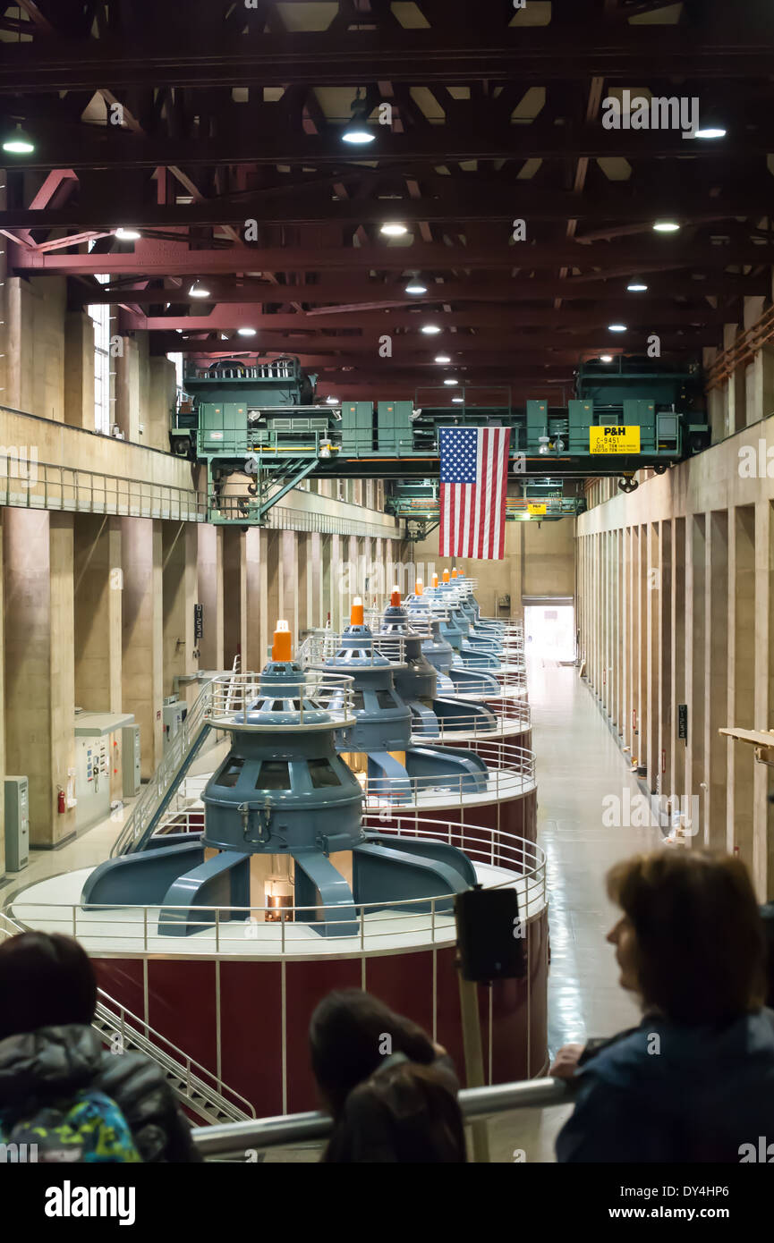 A tour group of tourists in the power plant of the Hoover Dam Stock