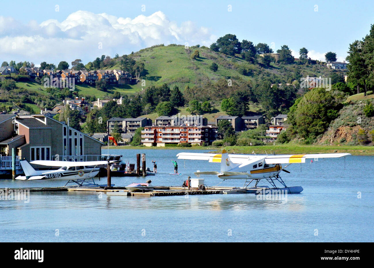 kayakers paddle past seaplanes at Waldo Point in Sausalito Stock Photo