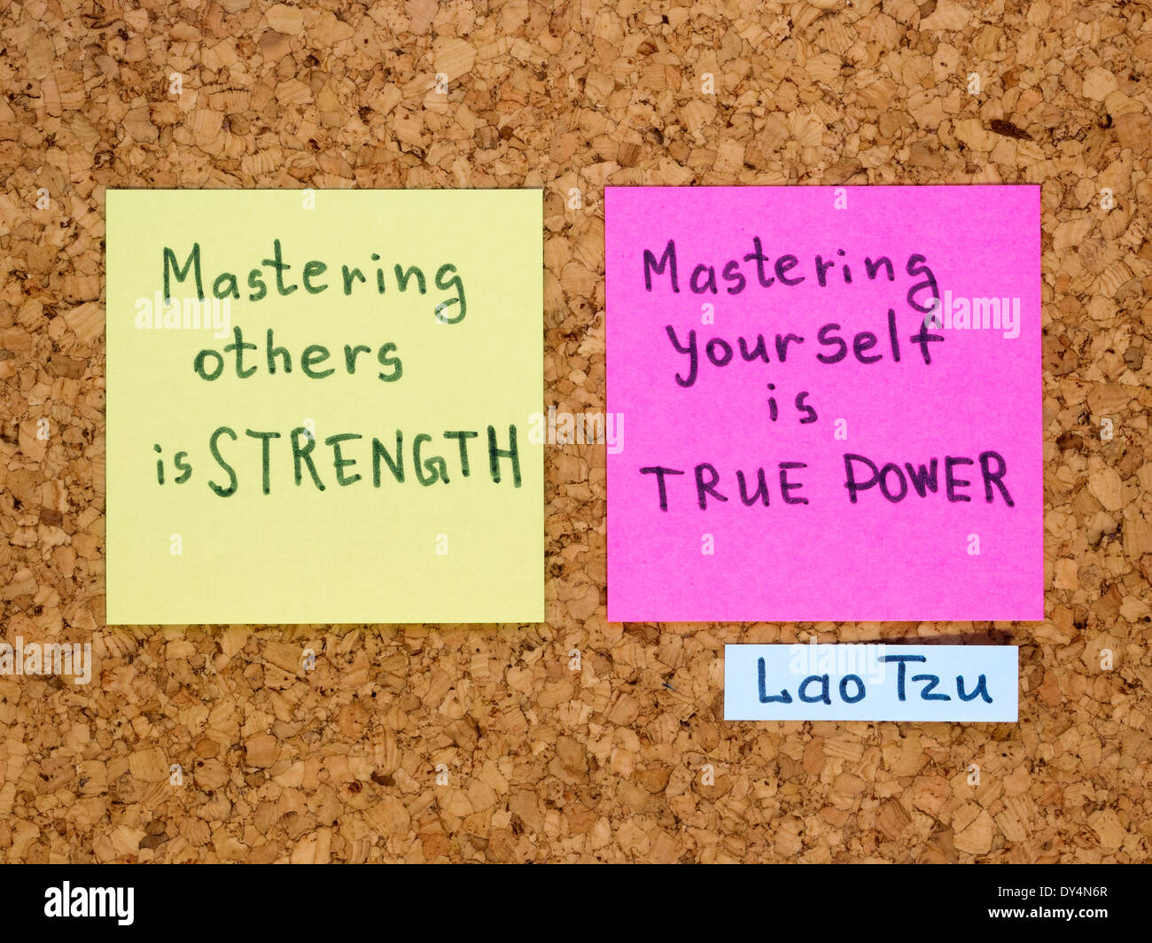 famous Lao Tzu quote interpretation with sticker notes on cork board Stock Photo