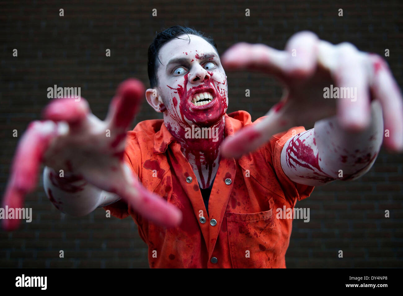 A frightening zombie covered in blood Stock Photo