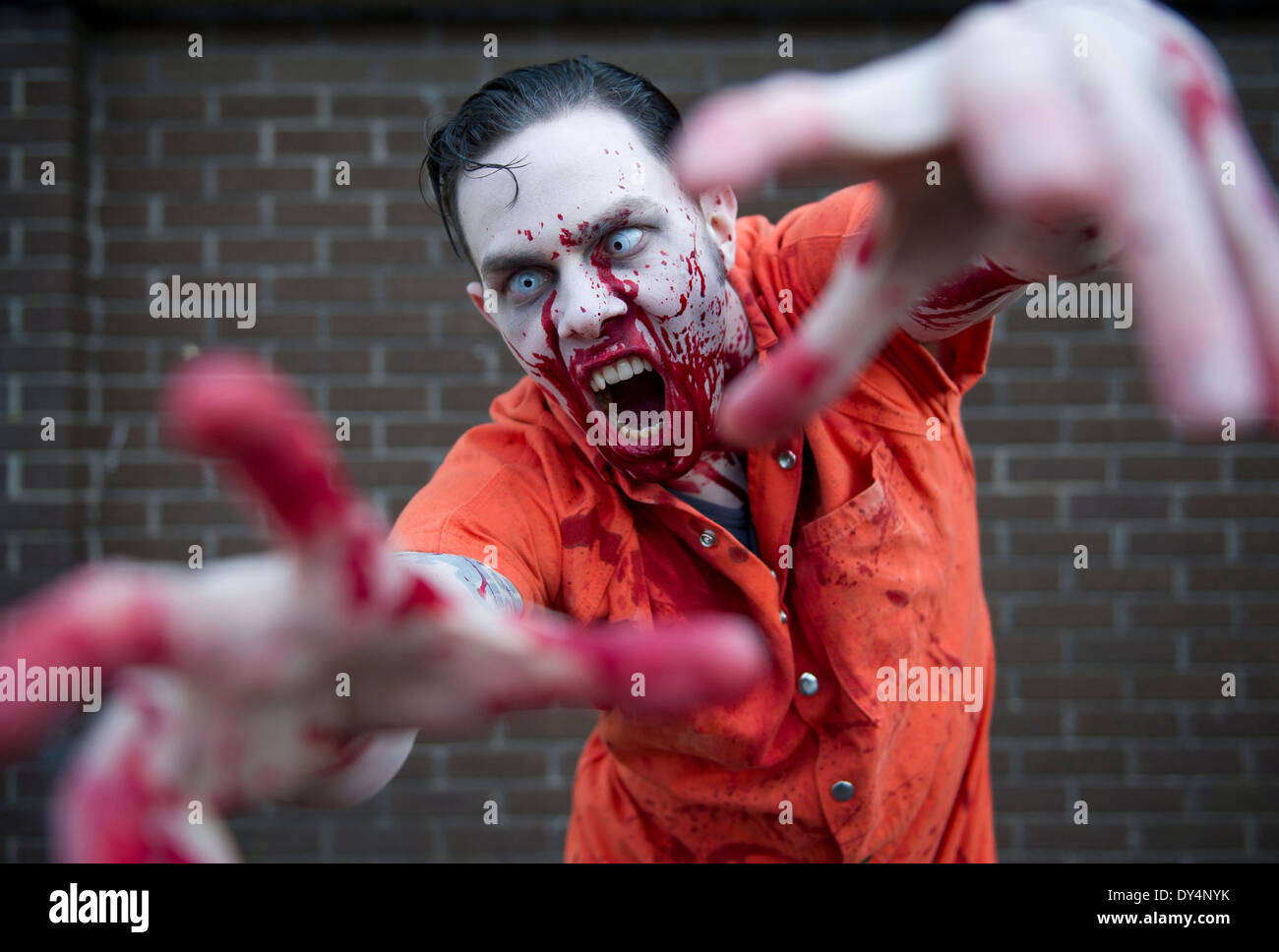 A frightening zombie covered in blood Stock Photo