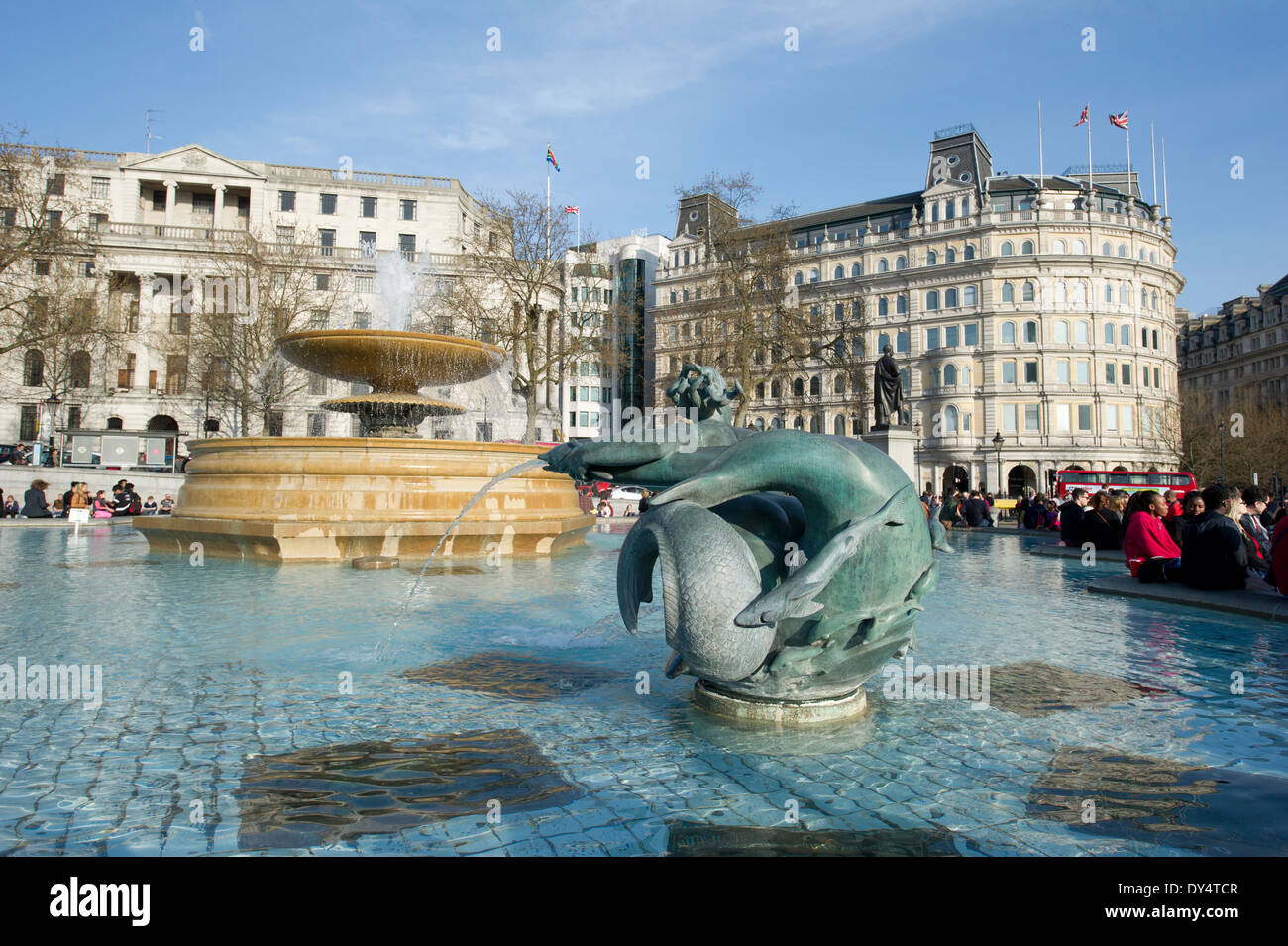 Iconic water fountain in the Trafalgar Square with the dolphin statue ...