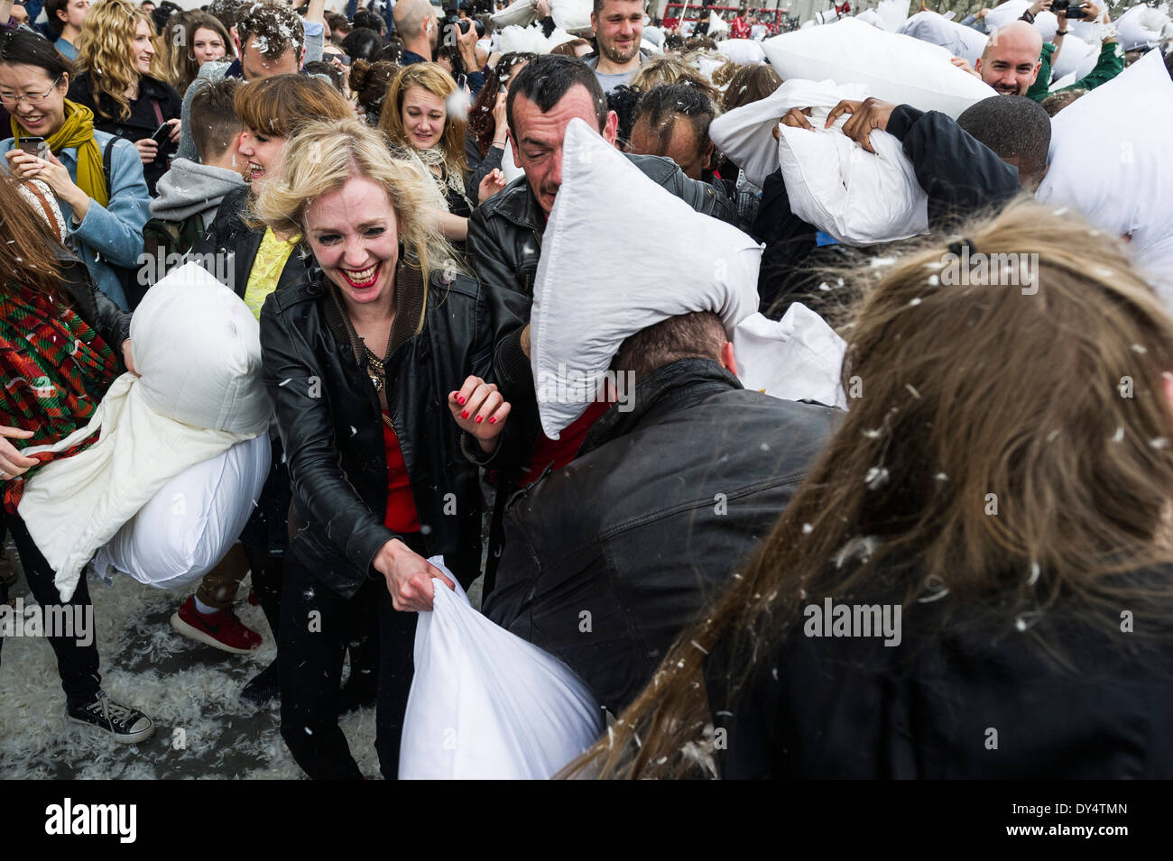 People gathering to participate in the International Pillow Fight Day. Stock Photo