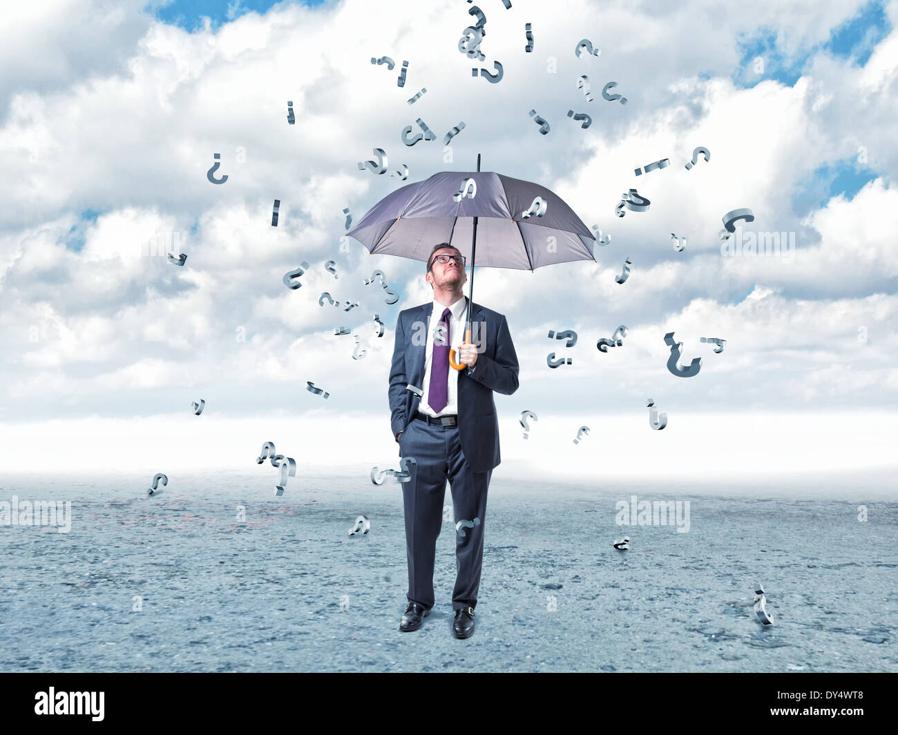 businessman with umbrella and question mark rain Stock Photo Alamy