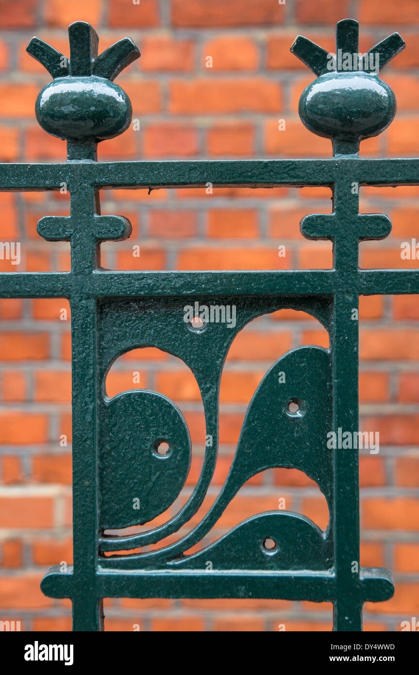 Decorative Metal Fencing With Red Bricks In The Background Stock