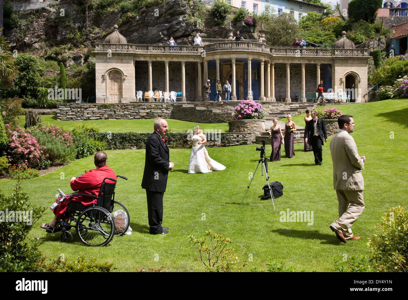 Wedding reception in gardens, man in wheelchair, Portmeirion, Wales, United Kingdom Stock Photo