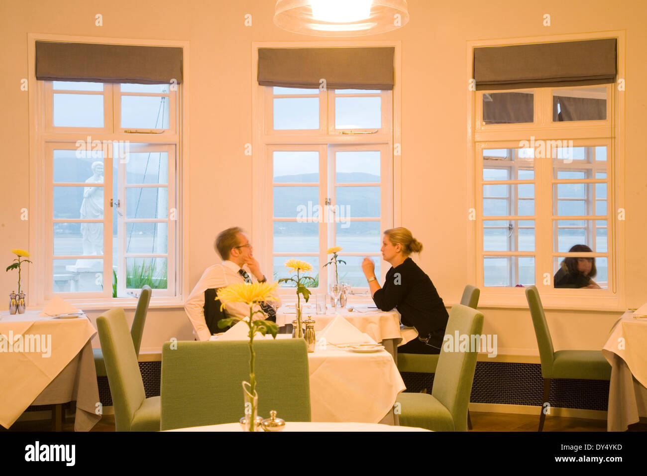 Portmeirion couple at hotel restaurant for dinner. Portmeirion, North Wales, United Kingdom Stock Photo