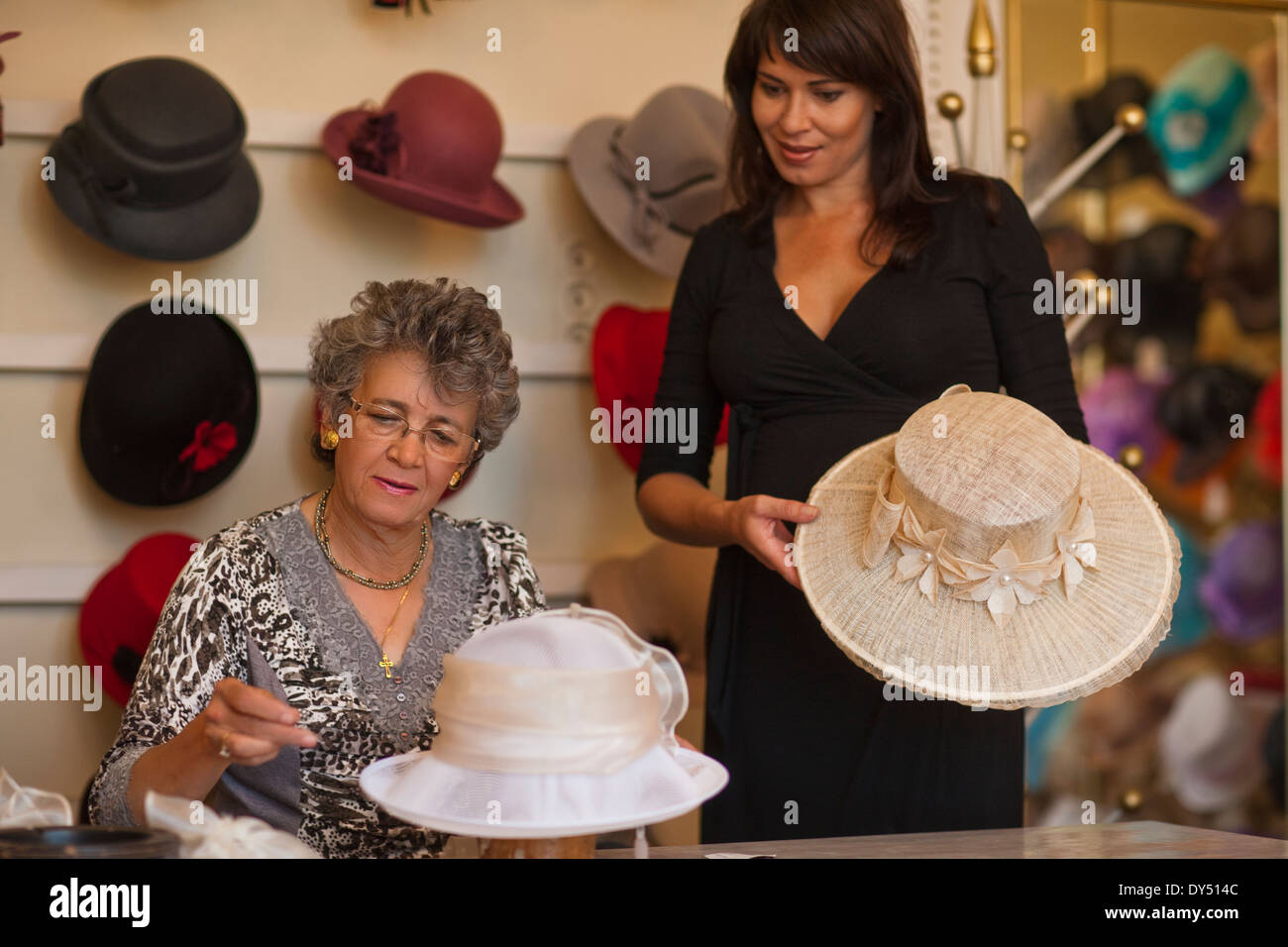 Adjusting hat hi-res stock photography and images - Alamy