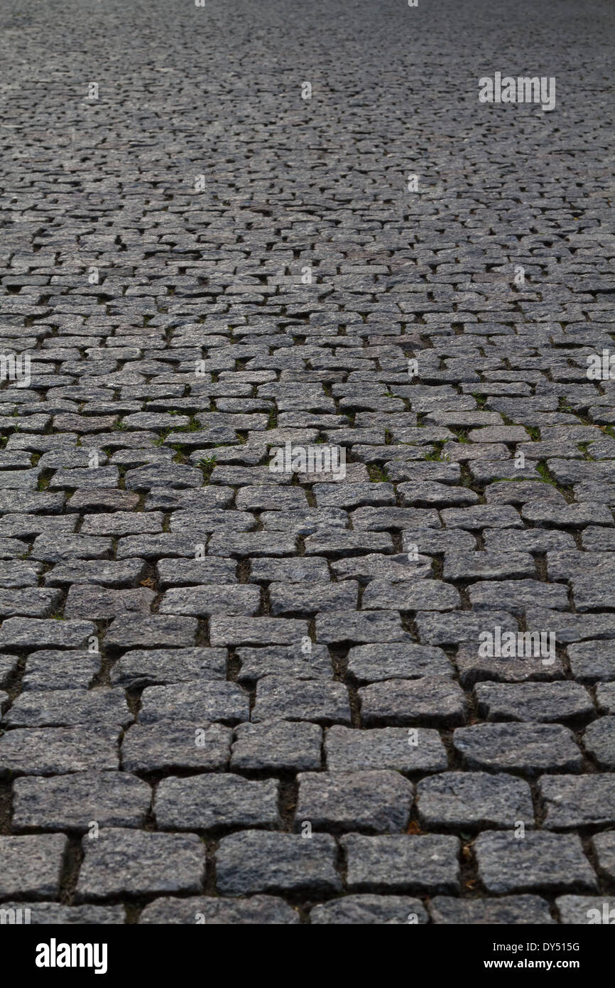 rough granite cobblestone street perspective Stock Photo