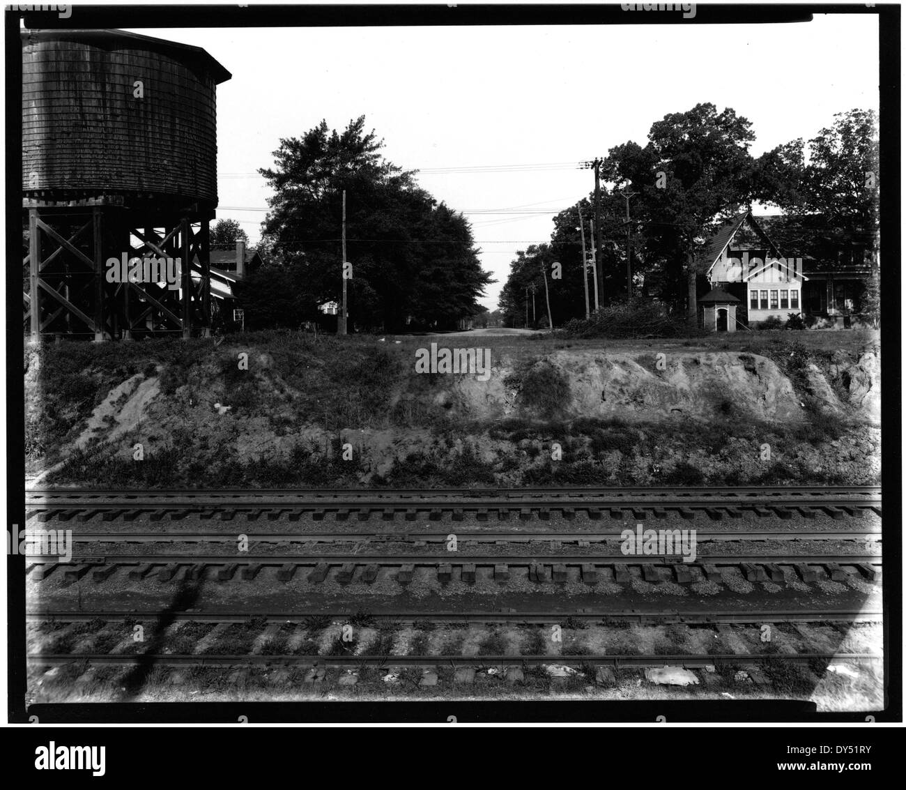 Water tank and railroad tracks Stock Photo