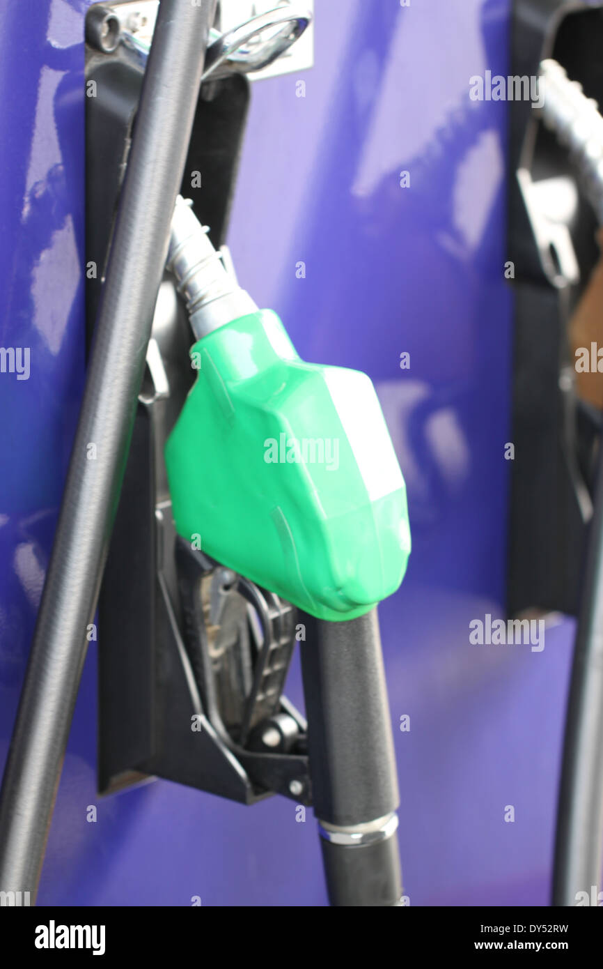 Fuel dispenser for refueling in gas station. Stock Photo
