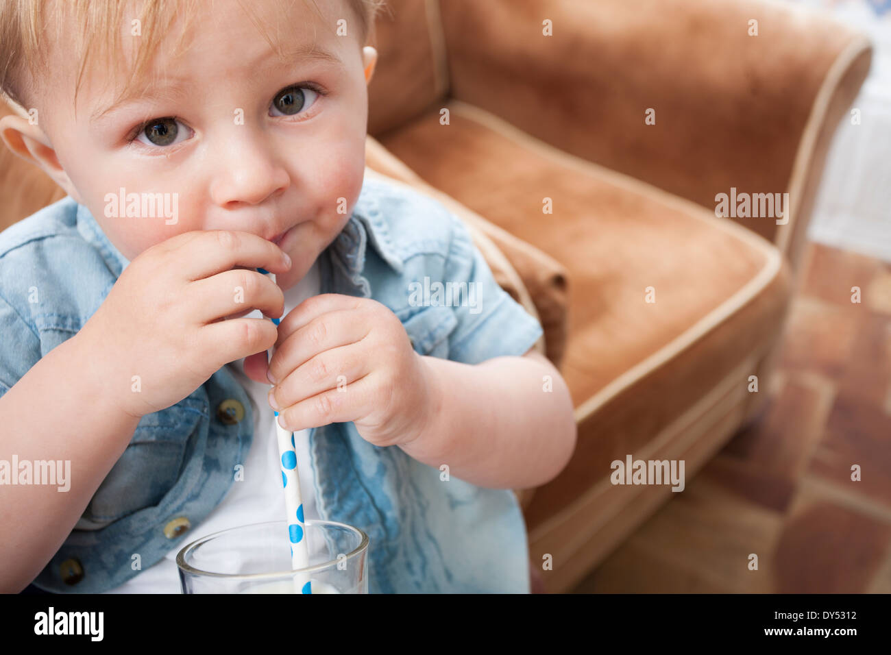 Baby boy drinking milk Stock Photo
