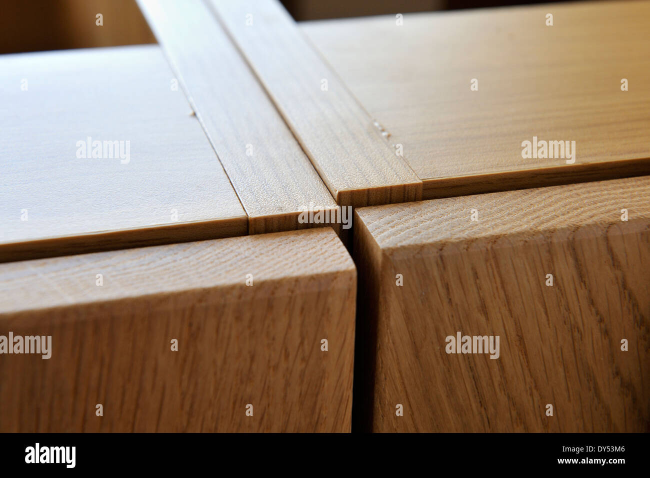 Building a kitchen from ready made units. Units not yet perfectly levelled and lined up. Stock Photo