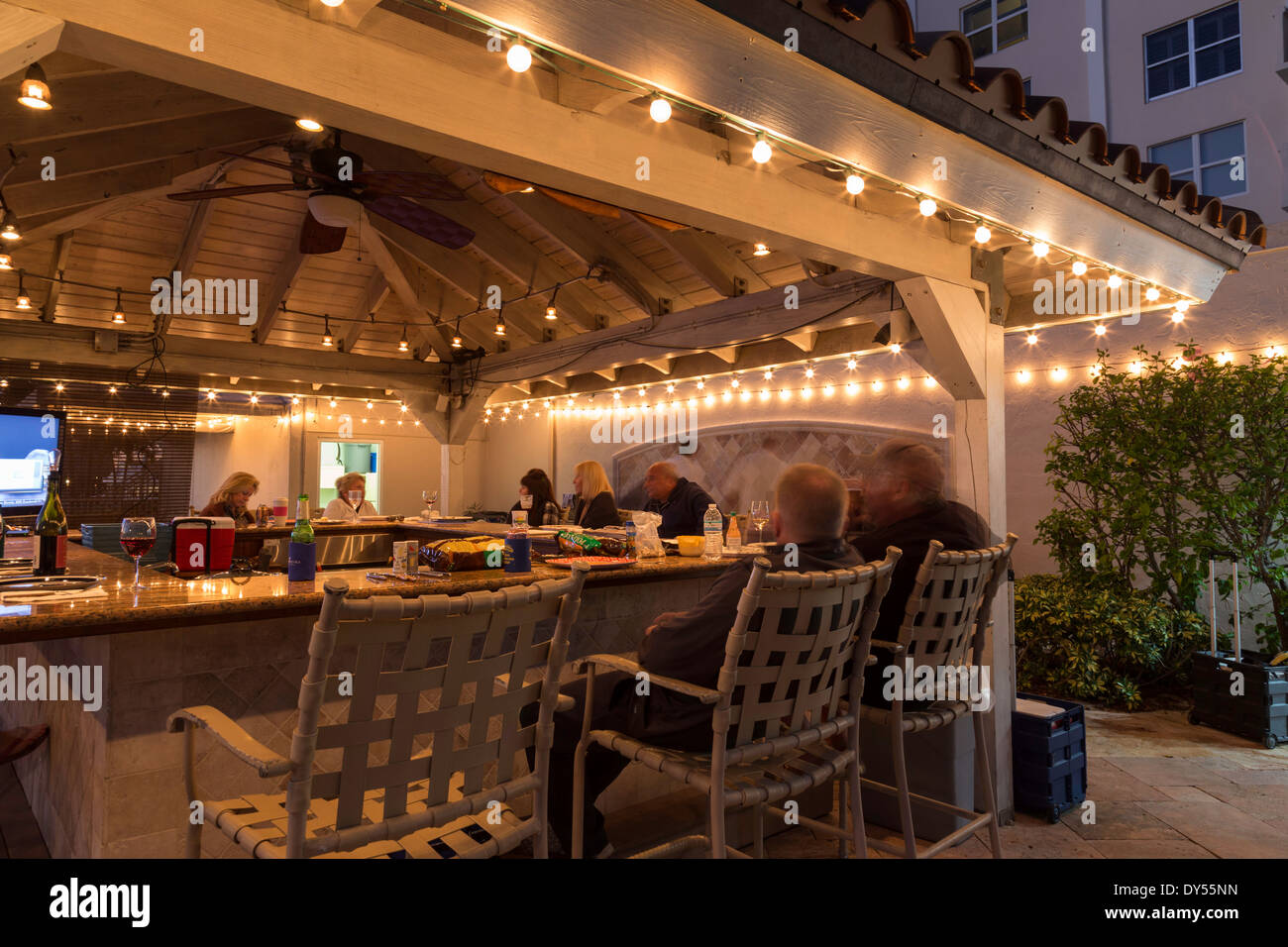 Tenants Enjoying the Tiki Bar Cabana, The Apartment Buildings