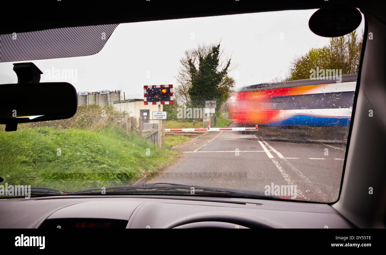 railway level crossing from inside car Wymondham Norfolk England UK Stock Photo