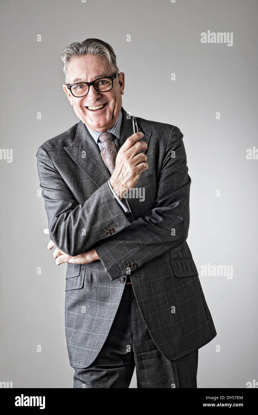 Portrait of senior man, wearing suit Stock Photo