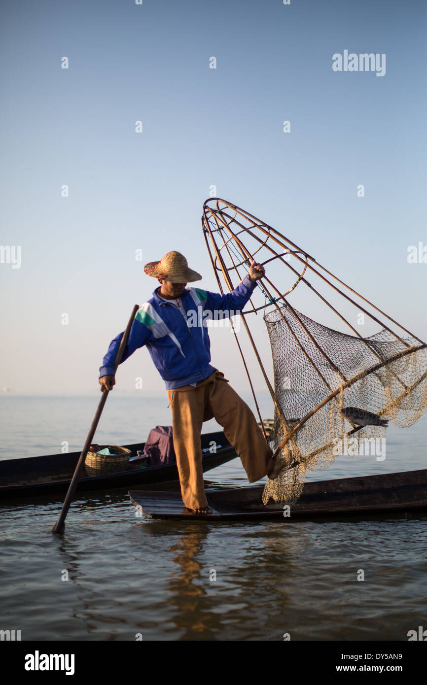 https://c8.alamy.com/comp/DY5AN9/a-fisherman-displays-his-catch-using-traditional-fishing-methods-on-DY5AN9.jpg