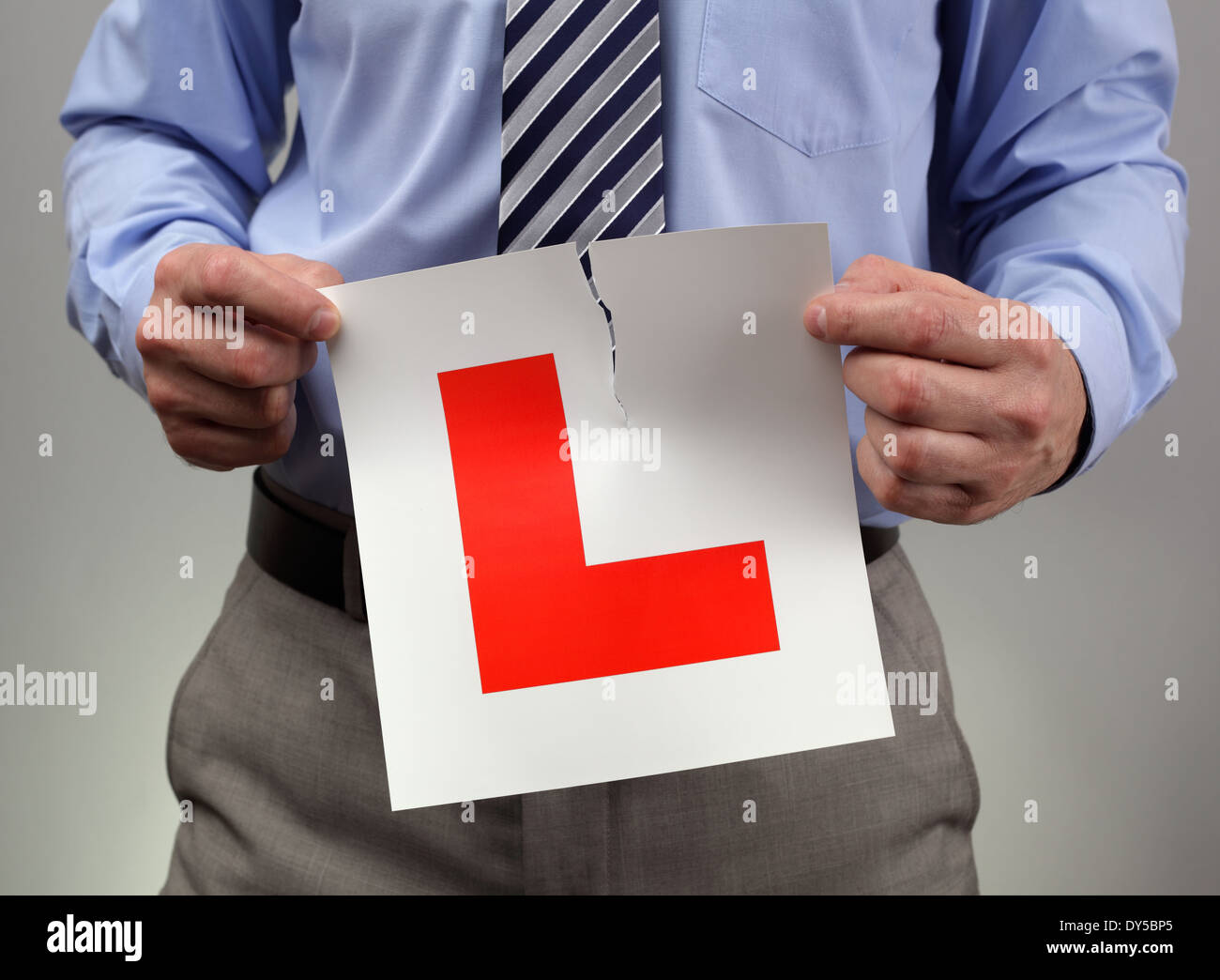 Tearing up L plate Stock Photo