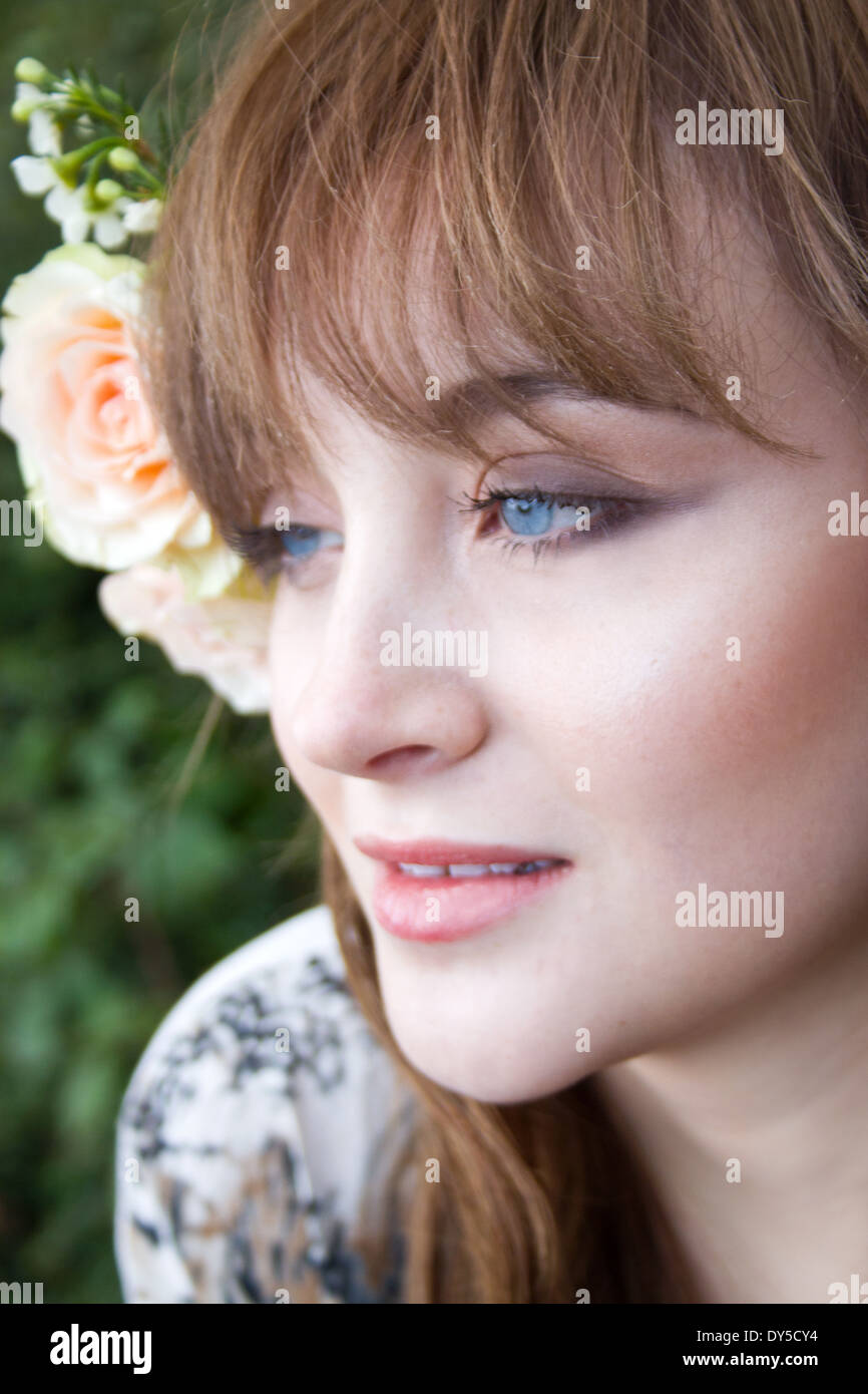Close up portrait of young woman daydreaming Stock Photo