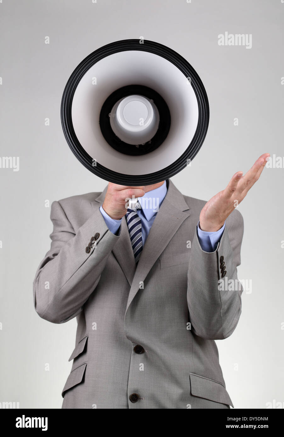 Businessman shouting through a megaphone Stock Photo