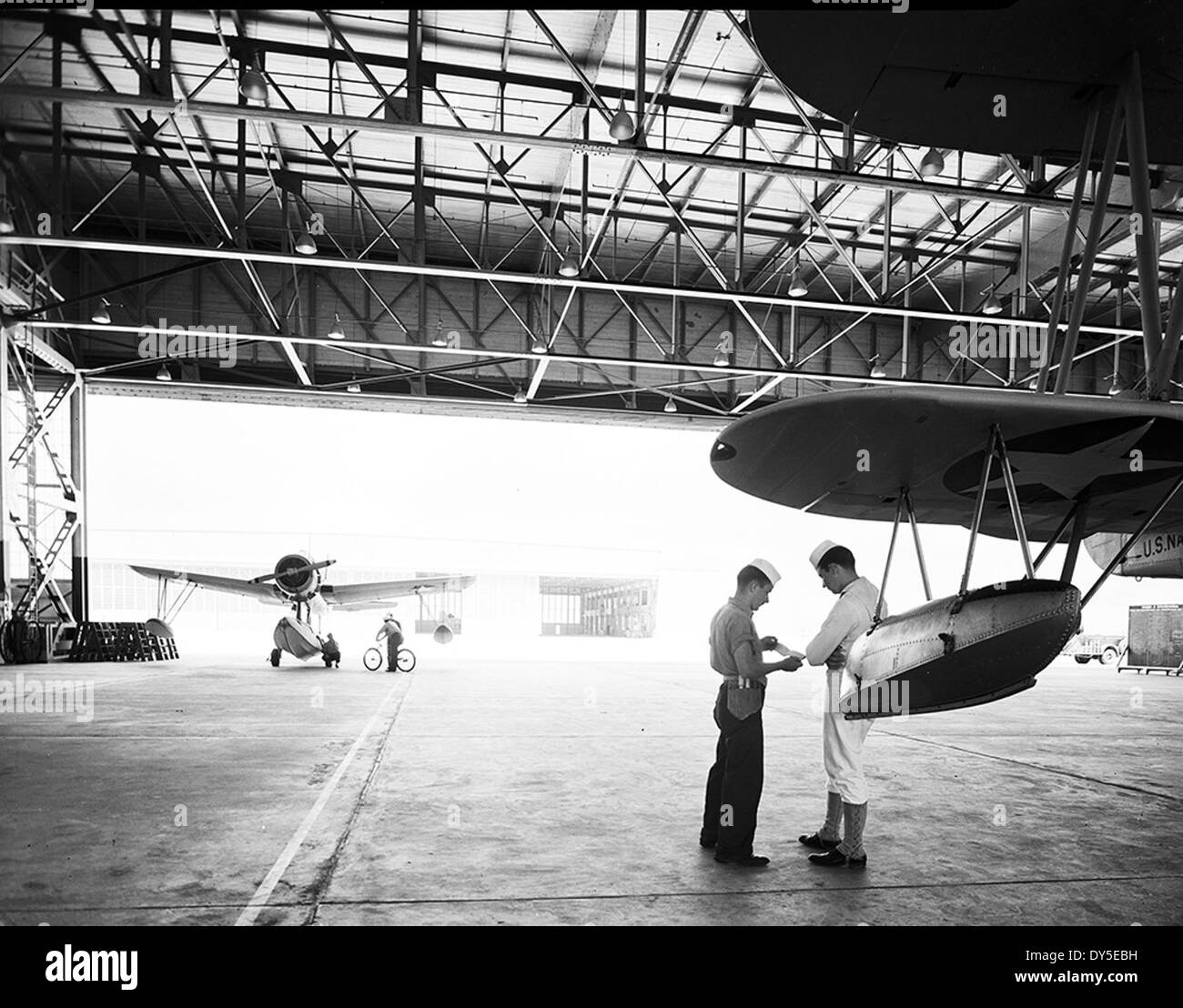 [Floatplanes in Hangar at Naval Air Station Corpus Christi, Bethlehem Steel Corporation] Stock Photo