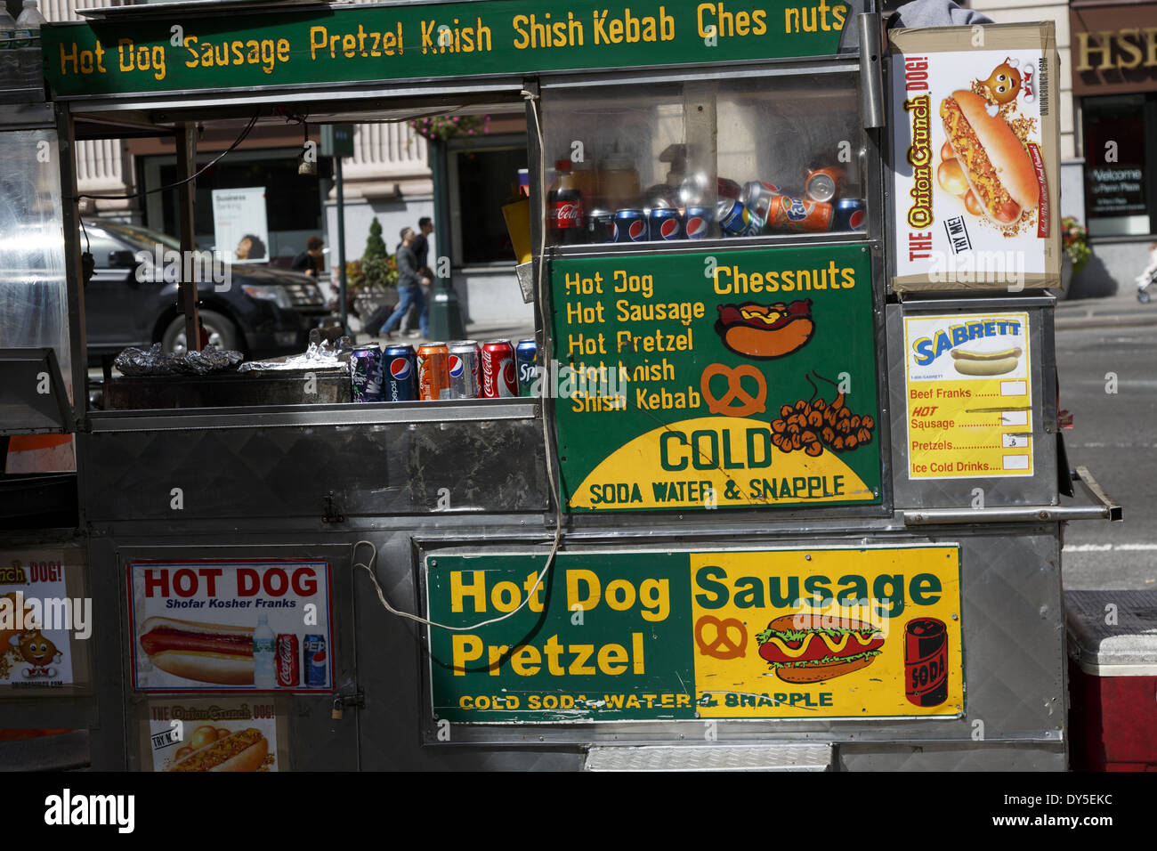 Street vendor cart selling hot dogs and pretzels Manhattan New York City USA Stock Photo