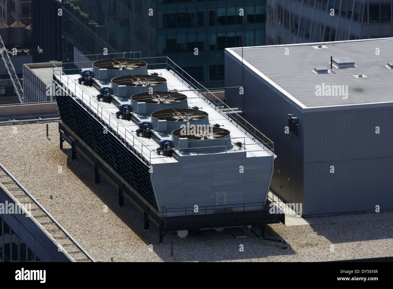 Industrial sized air conditioning and ventilation units on top of 1166 Avenue of the Americas International Paper Building New York, USA Stock Photo