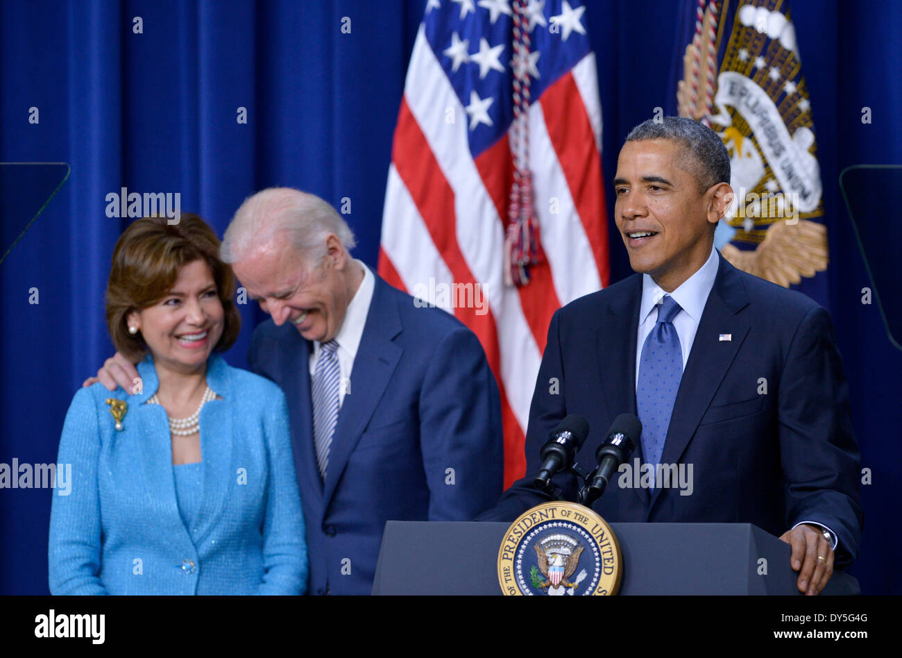 Washington, DC, USA. 7th Apr, 2014. U.S. President Barack Obama (R) and Vice President Joe Biden (C) attend a swearing-in ceremony of Maria Contreras-Sweet (L) as the new administrator of the Small Business Administration (SBA) in the South Court Auditorium of the Eisenhower Executive Office Building, next to the White House in Washington, DC, April 7, 2014. Born in Mexico, Contreras-Sweet immigrated to the United States when she was a child. During her career, she has a mix of corporate and government experience to support small businesses. Credit:  Yin Bogu/Xinhua/Alamy Live News Stock Photo