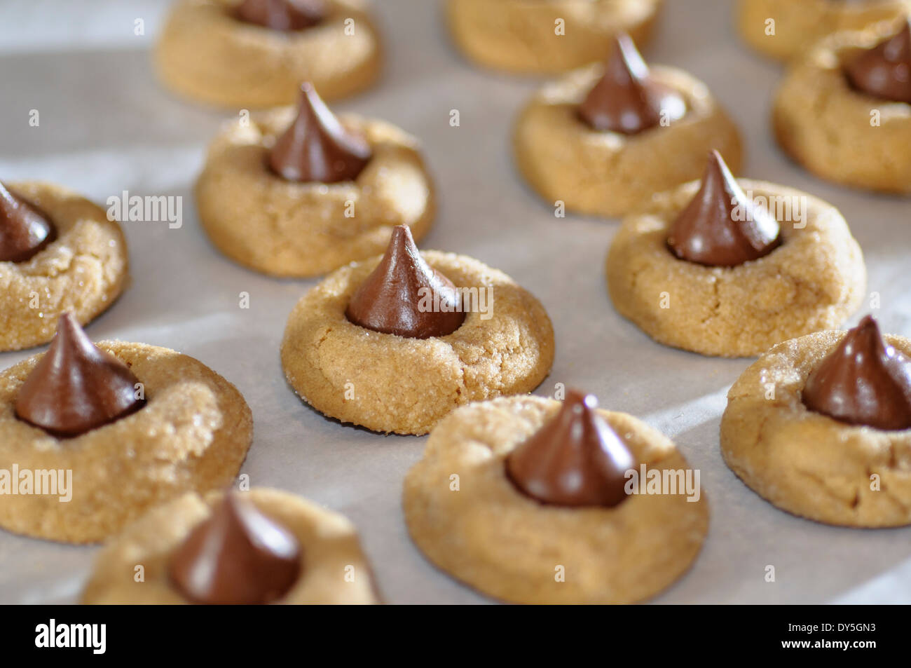 Chocolate kiss topped peanut butter cookie Stock Photo Alamy