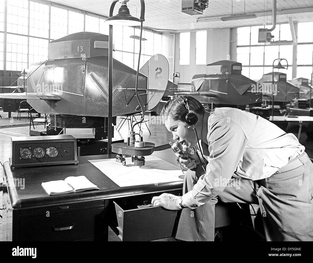 [Military Personnel Using Link Trainer, Pepperell Manufacturing Company] Stock Photo