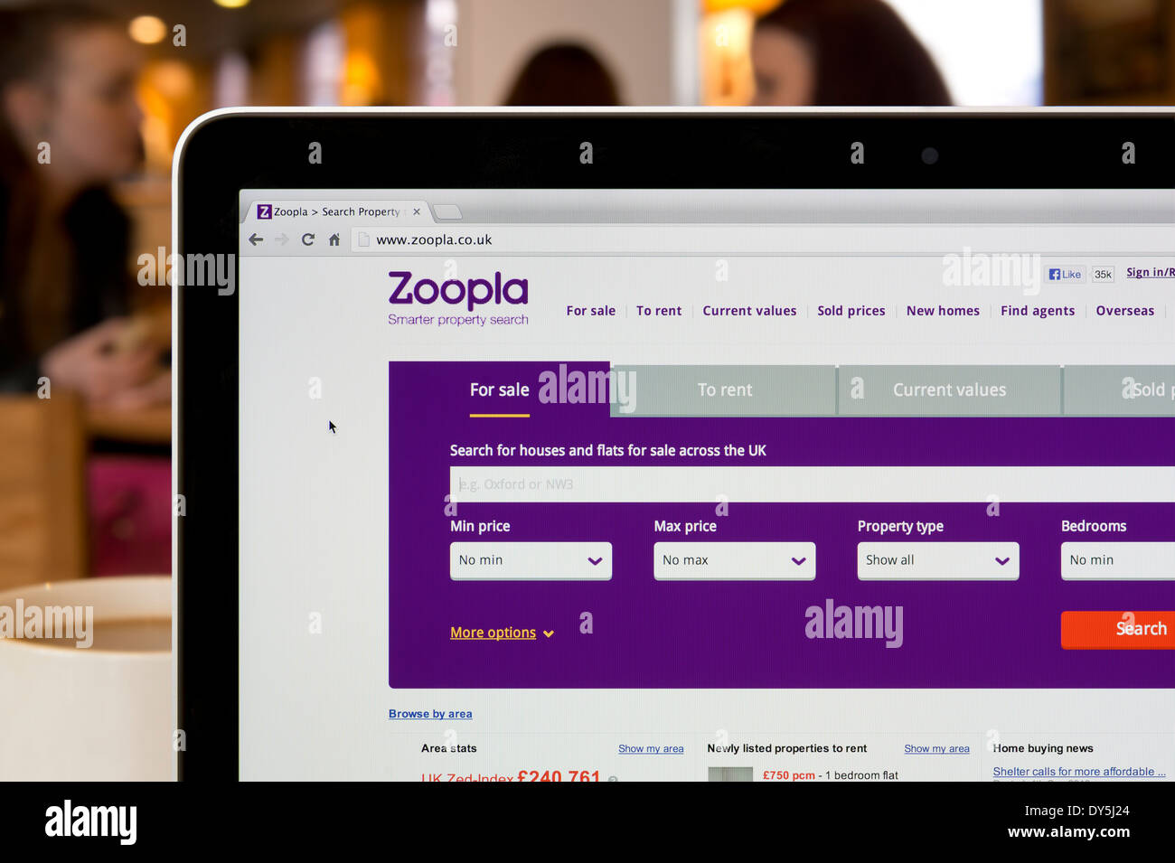 The Zoopla website shot in a coffee shop environment (Editorial use only: print, TV, e-book and editorial website). Stock Photo