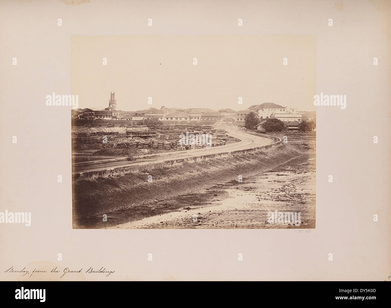 This historical image shows Bombay, India, from the Grant Buildings, capturing the commerce and port activity in the city. The Grant Buildings were used for storage, warehouses, and offices. Stock Photo