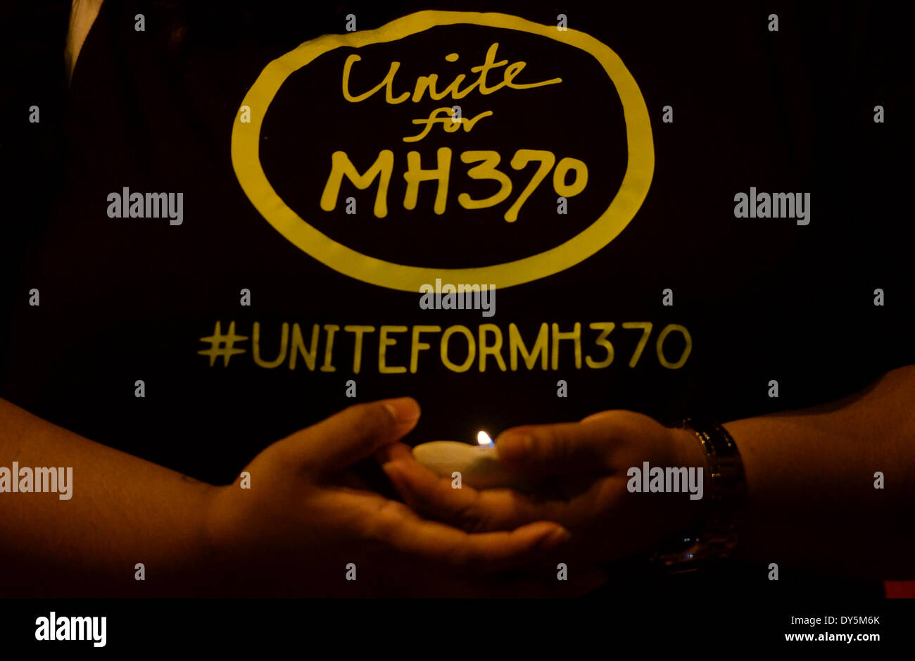 KUALA LUMPUR, MALAYSIA APRIL 7 A women holds candles during a