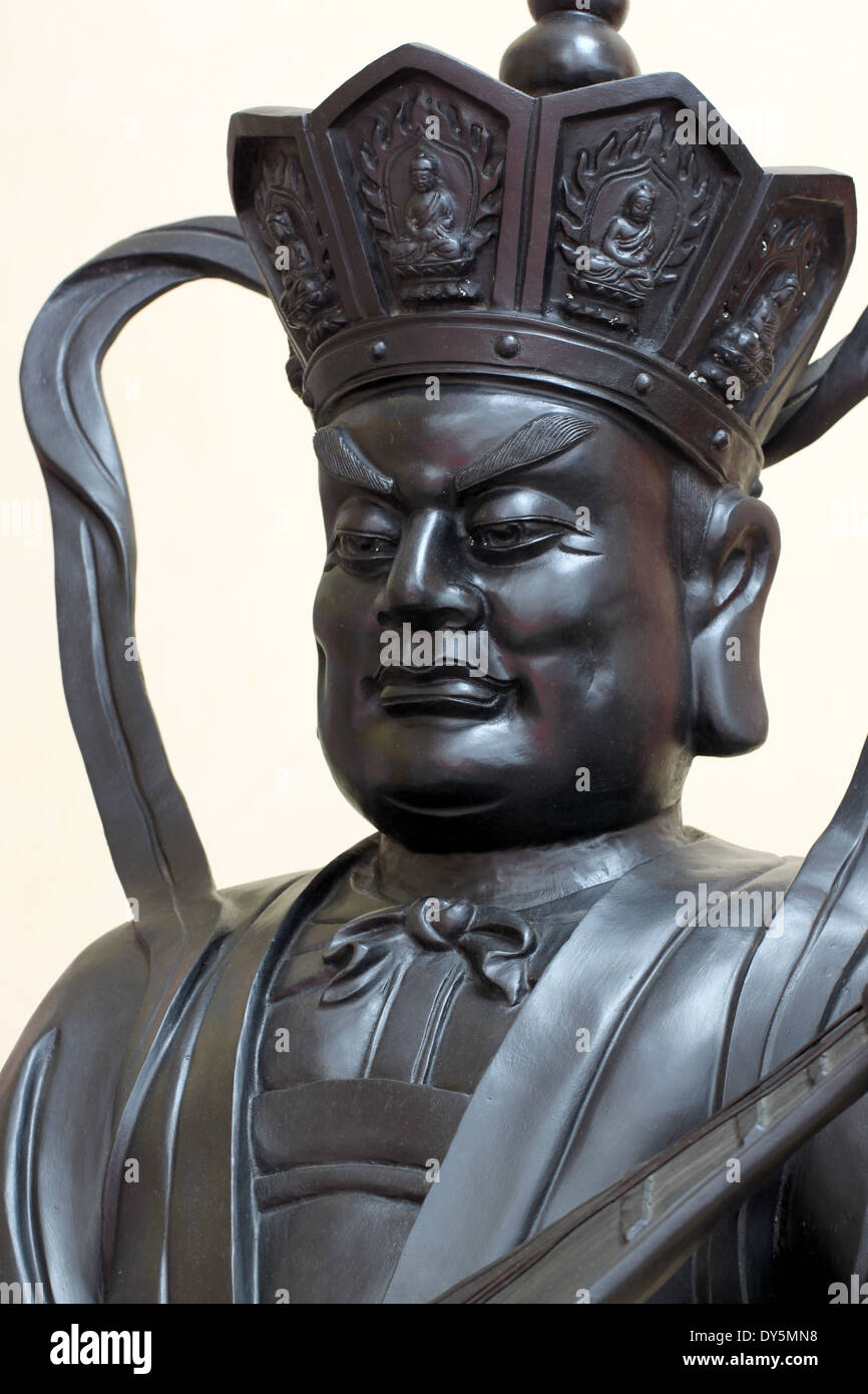 Black deity statues of Chinese religion in temple Stock Photo Alamy